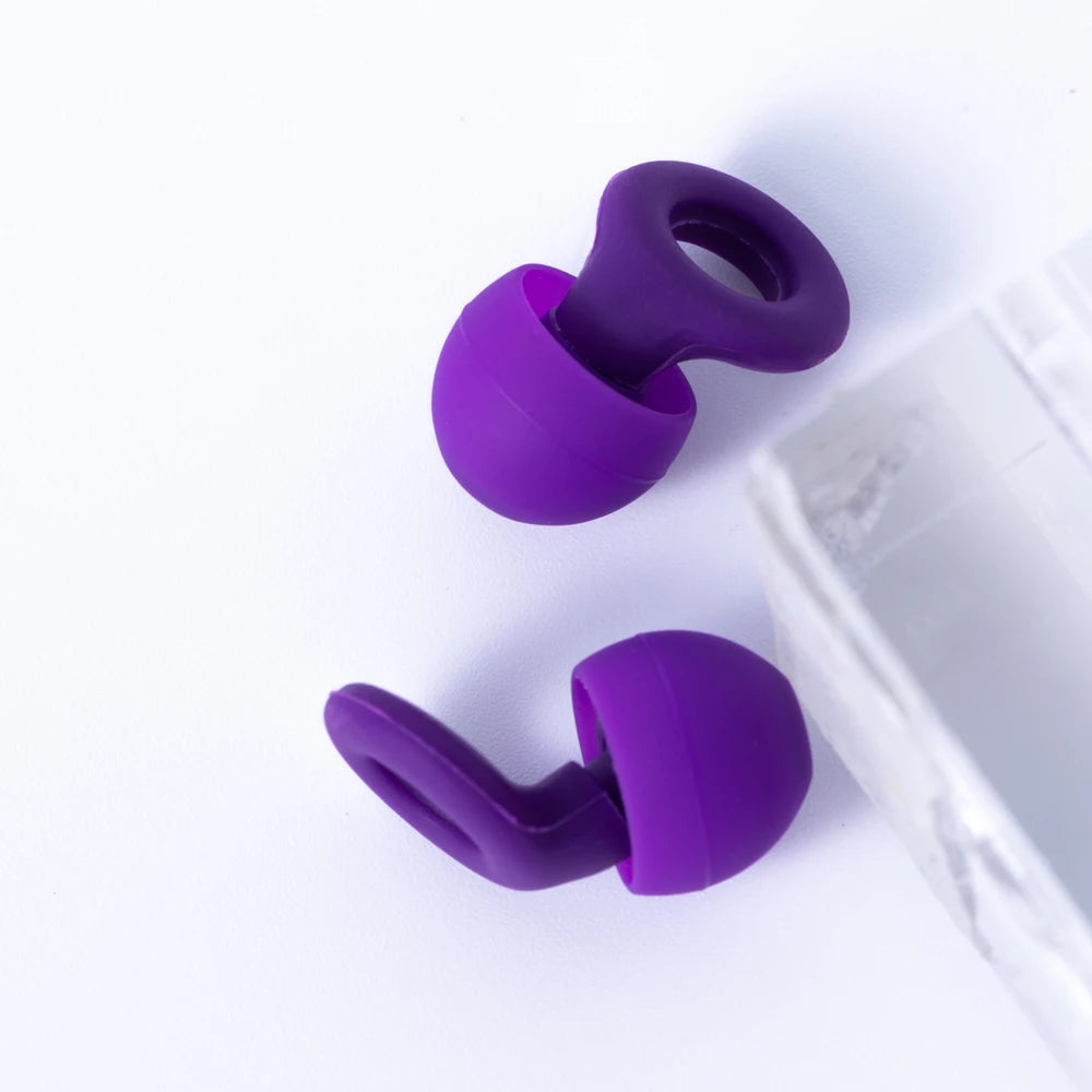 Quiet-silicone ear plugs for travel